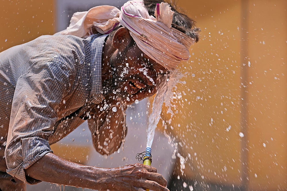 Heatwave in parts of India - | Photo: AP/Rajesh Kumar Singh